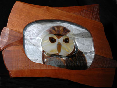 The Laughing Owl and the Smiloden Cat